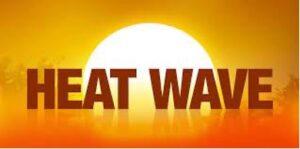 Hot sun in the background under the words heat wave.